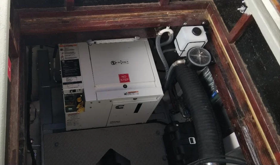Cummins Onan marine generator installed in the engine bay of training vessel Beagle II