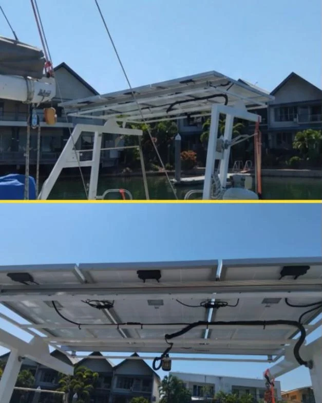 Solar array on a yacht stern arch with neatly loomed cabling at a Darwin marina