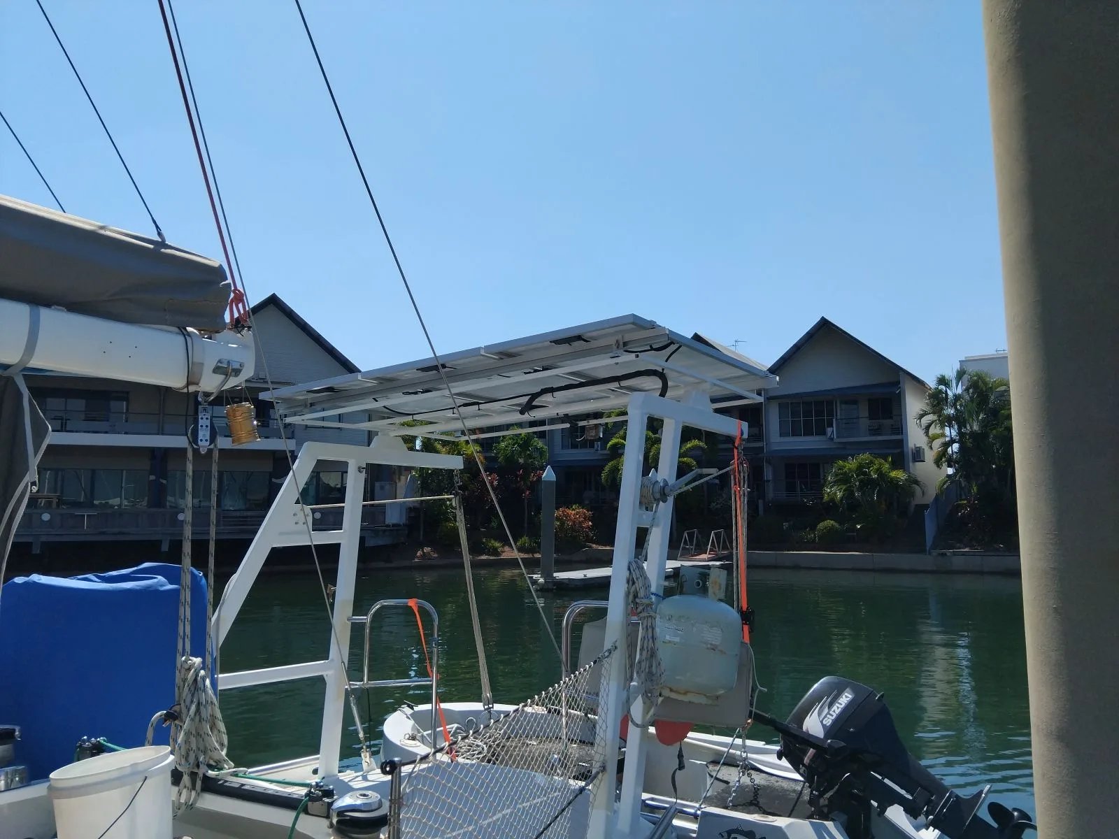 New Victron solar panels fitted to the stern arch of a yacht in a Darwin marina